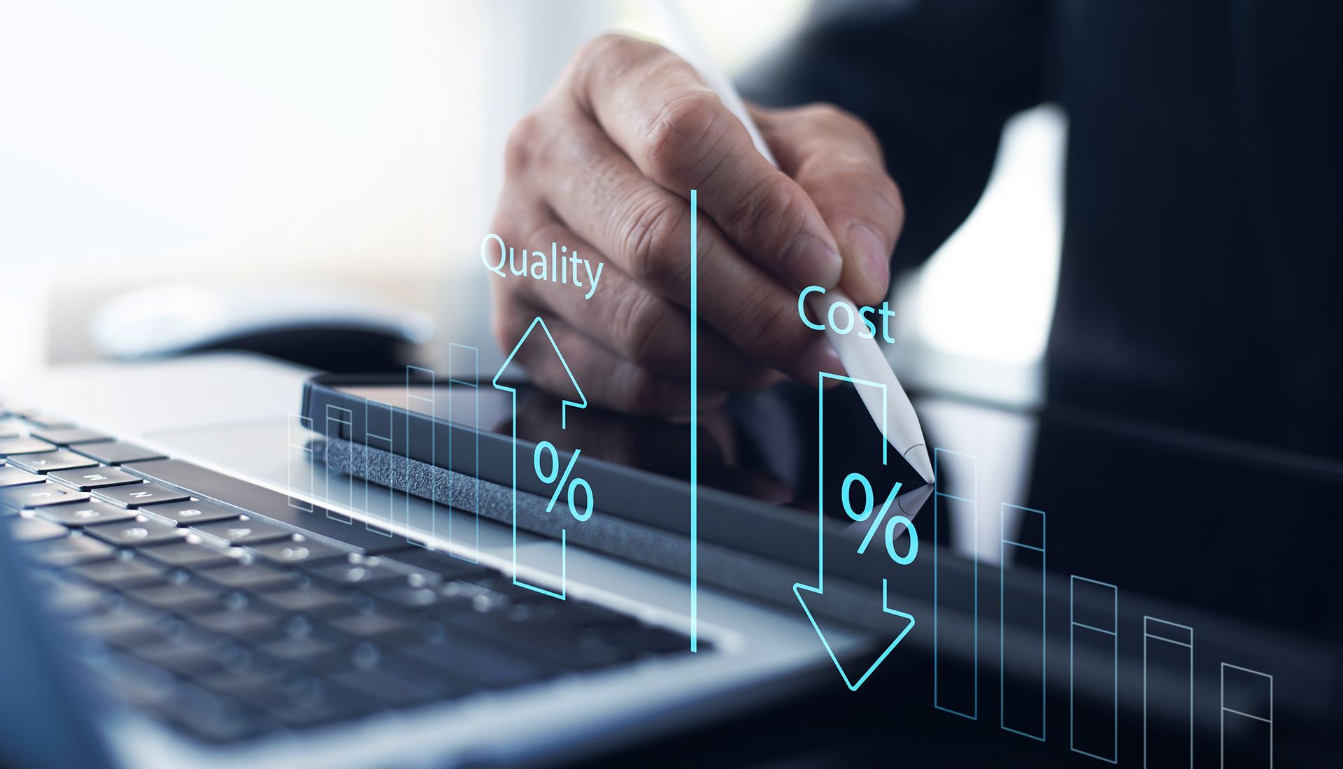 Person using a stylus on a laptop, with rising 