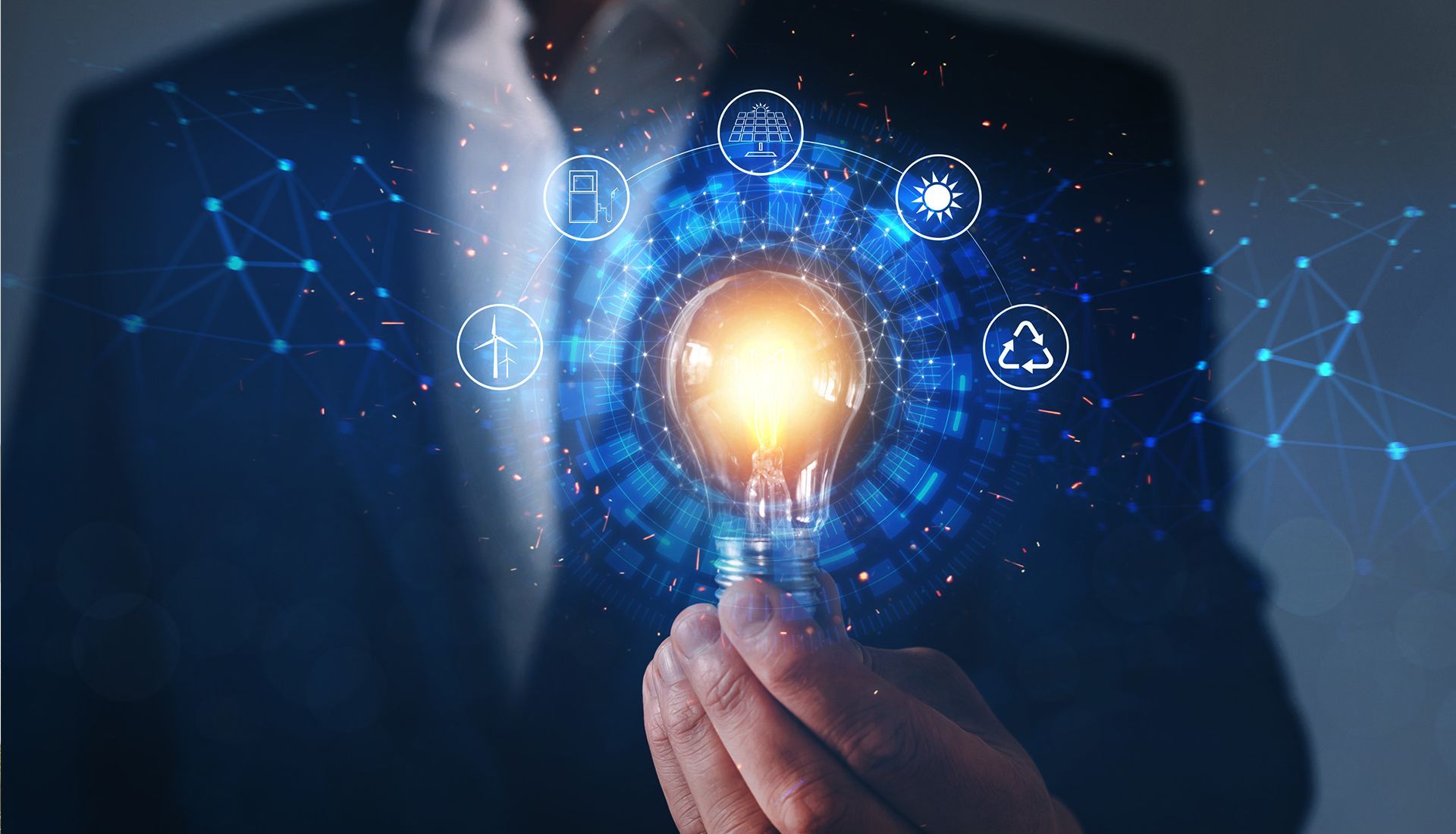 Person in suit holding a glowing lightbulb, surrounded by digital icons related to sustainability and innovation.