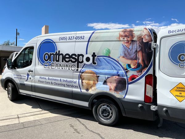 On the spot van parked in front of a house