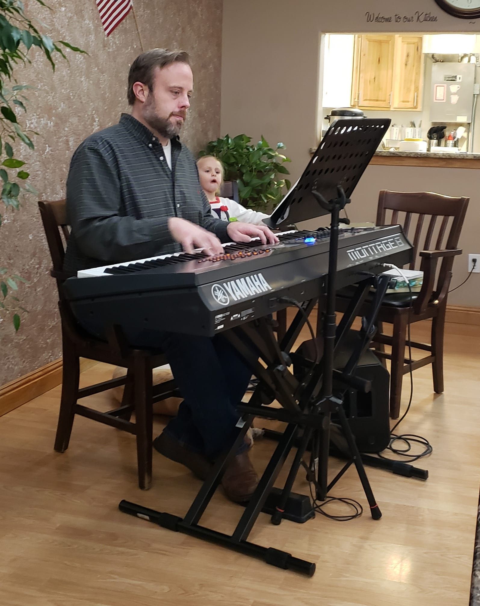 Sheldon from On the Spot Cleaning playing the piano 