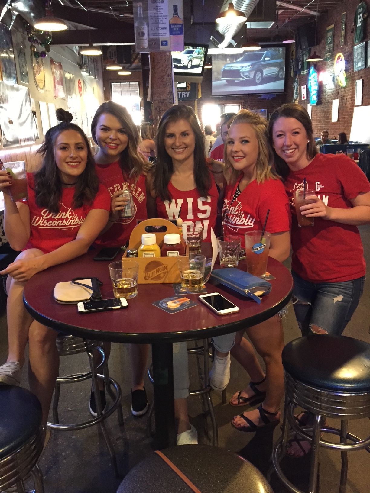 swanky's sports bar flag with Wisconsin W on it