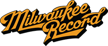 The milwaukee record logo is yellow and black on a white background.