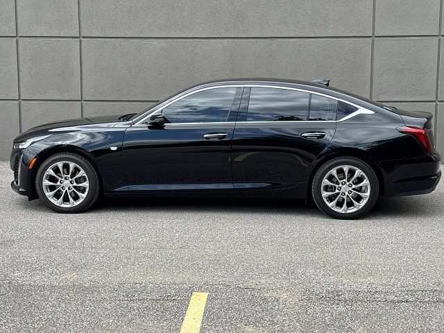 A black lincoln continental is shown on a white background.