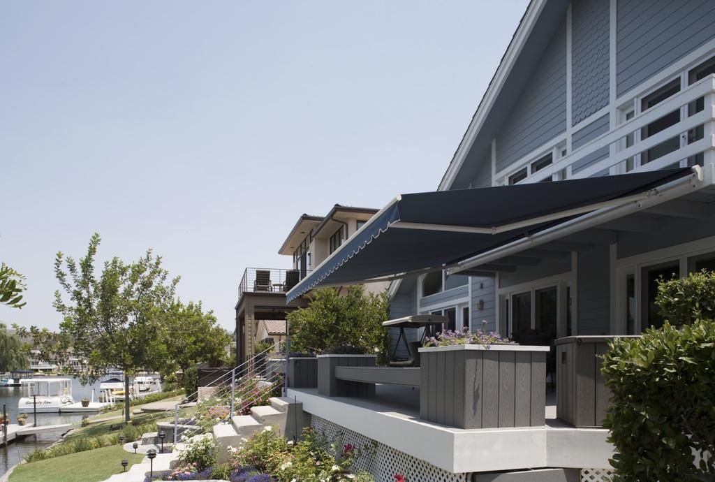 A house with a large awning on the side of it