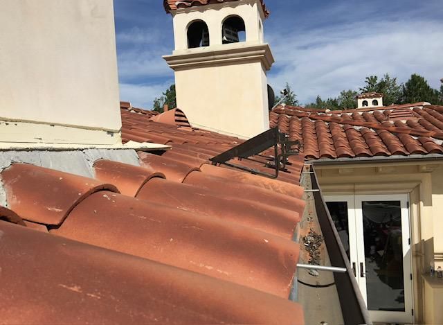 A roof with a chimney on top of it