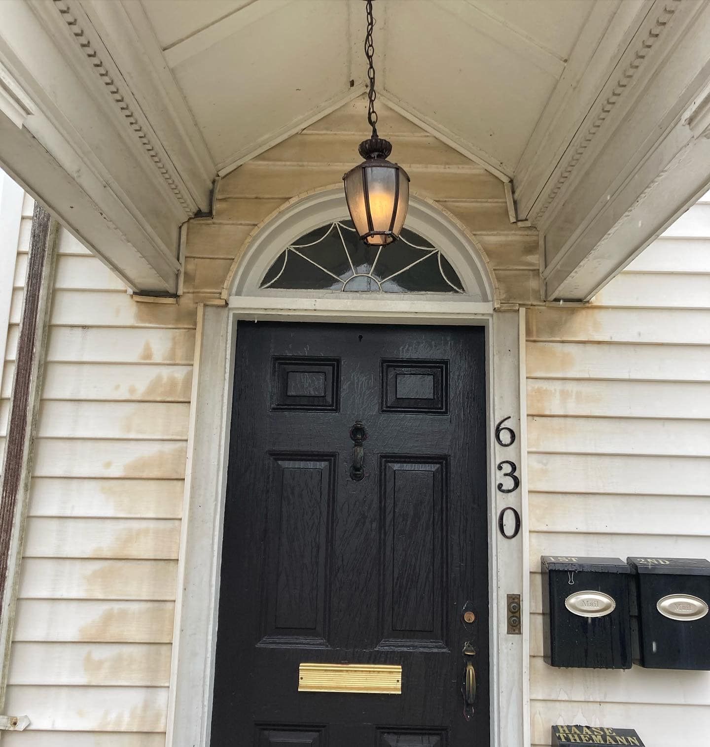 A black door with the number 630 on it