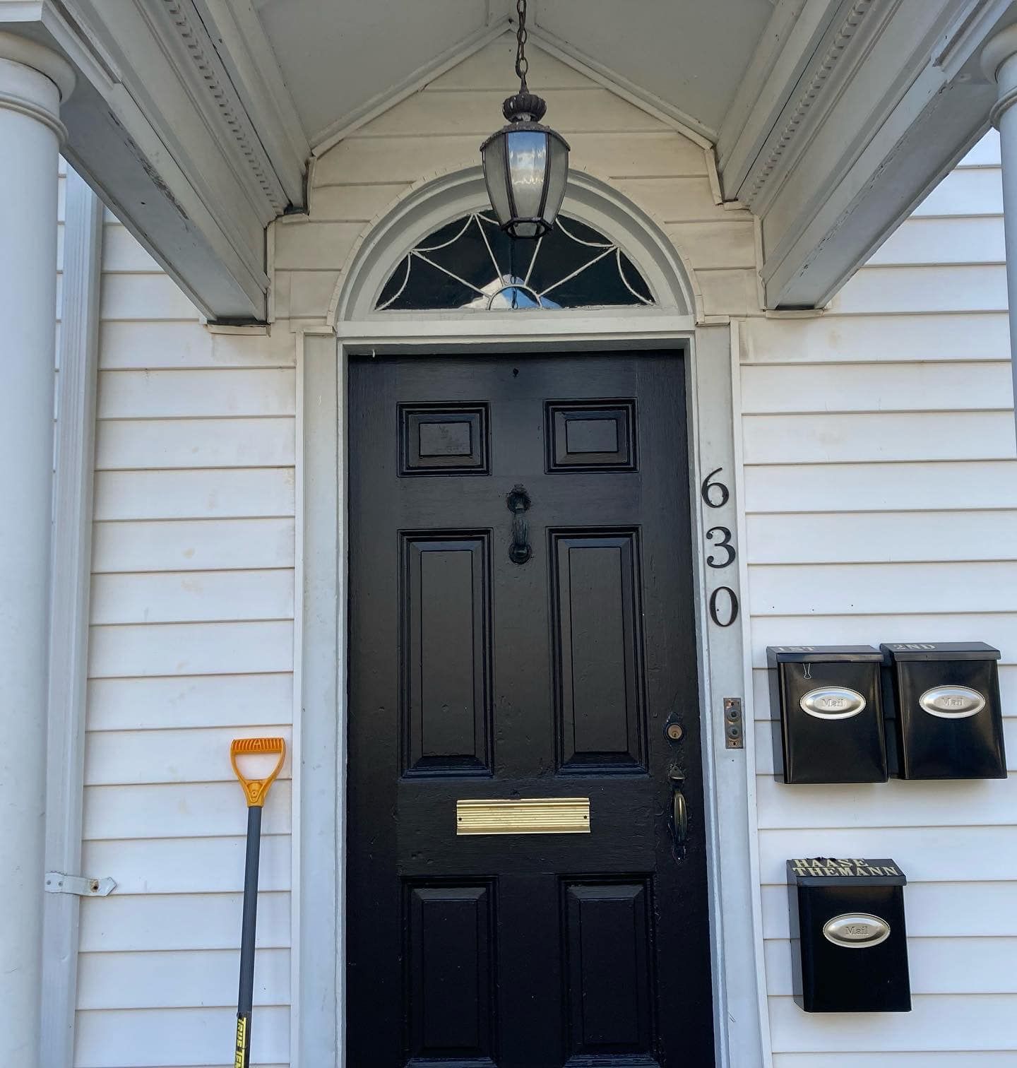 A black door with the number 630 on it