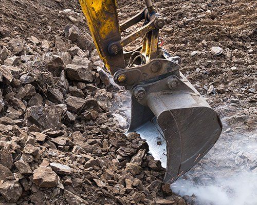 Digging Rocks — St. Marys, Ohio — Auglaize Equipment Rental