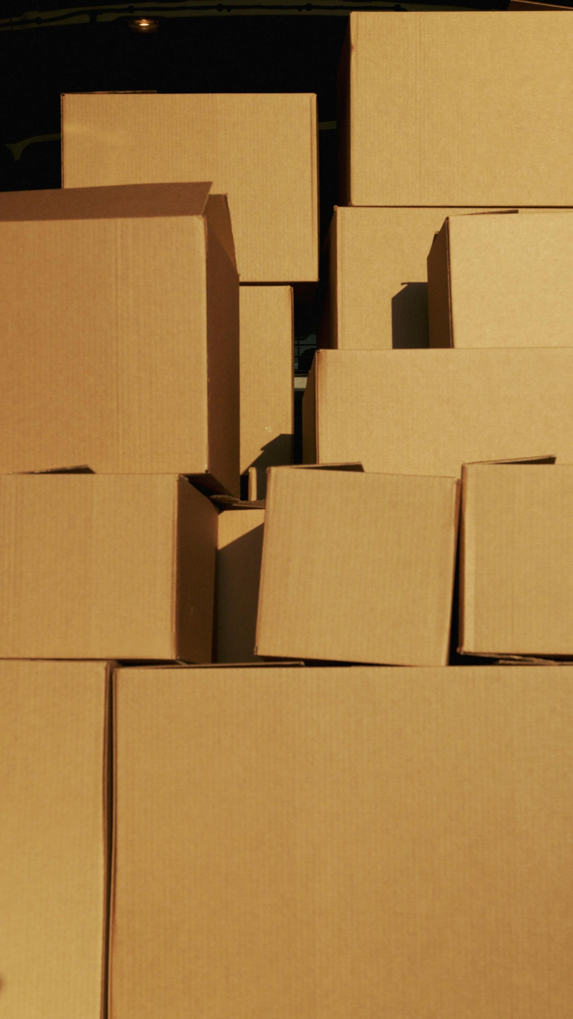 A pile of cardboard boxes stacked on top of each other
