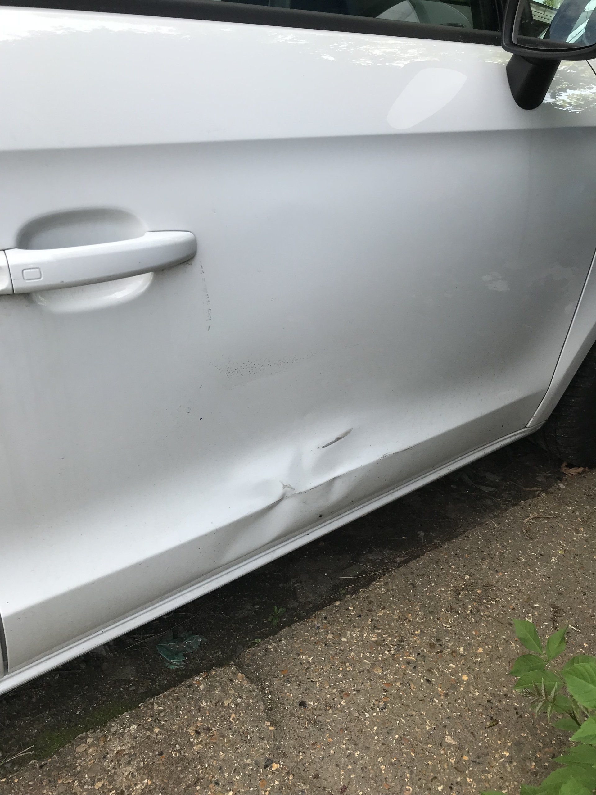 minor dent on a car door