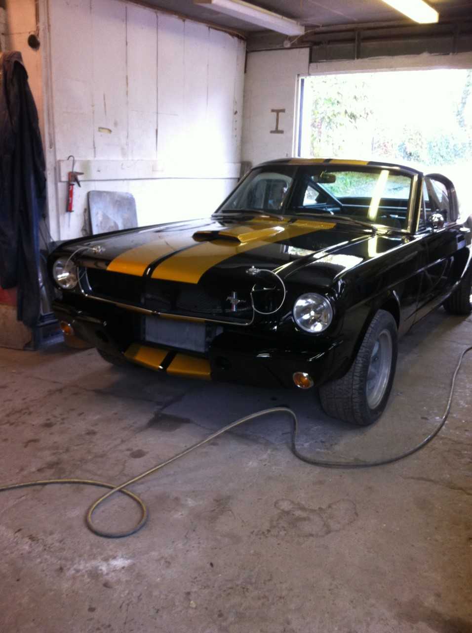 customised vintage car parked in a garage