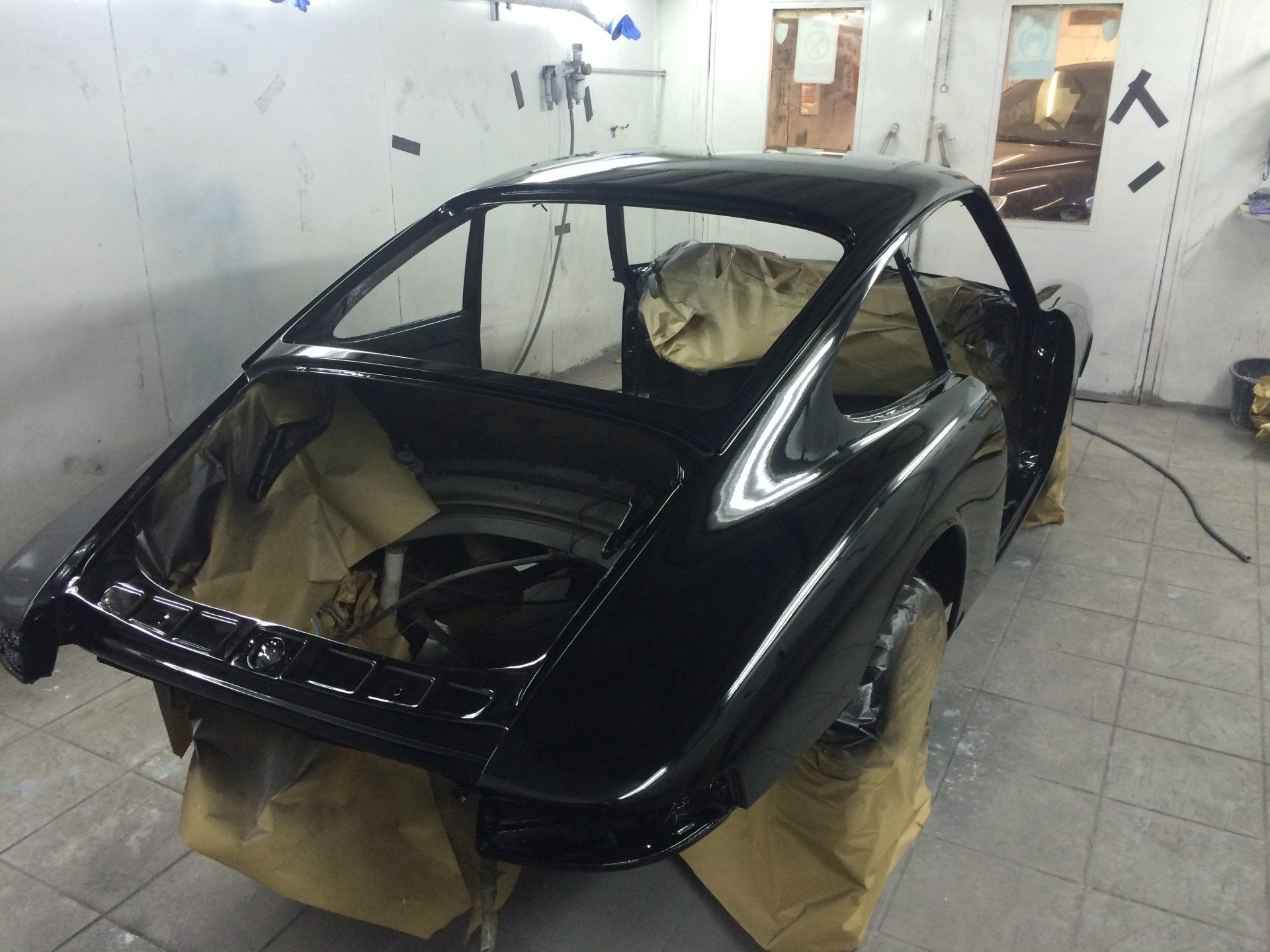 repainting the skeleton of an old car