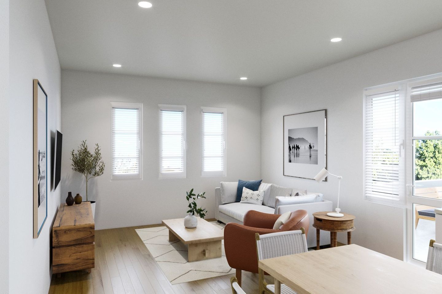 A living room with a couch , chair , table and television.