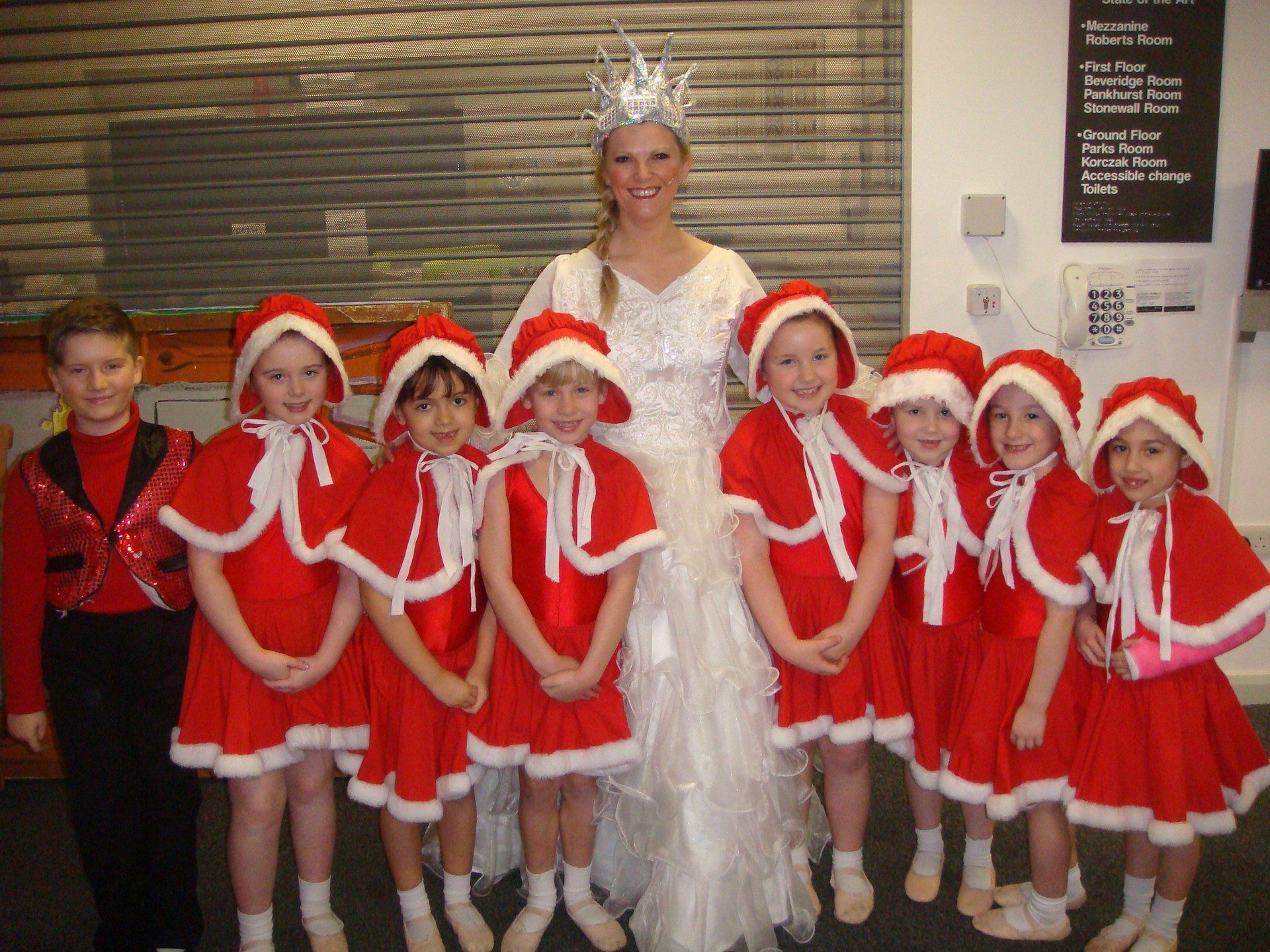 Children wearing Christmas themed dress