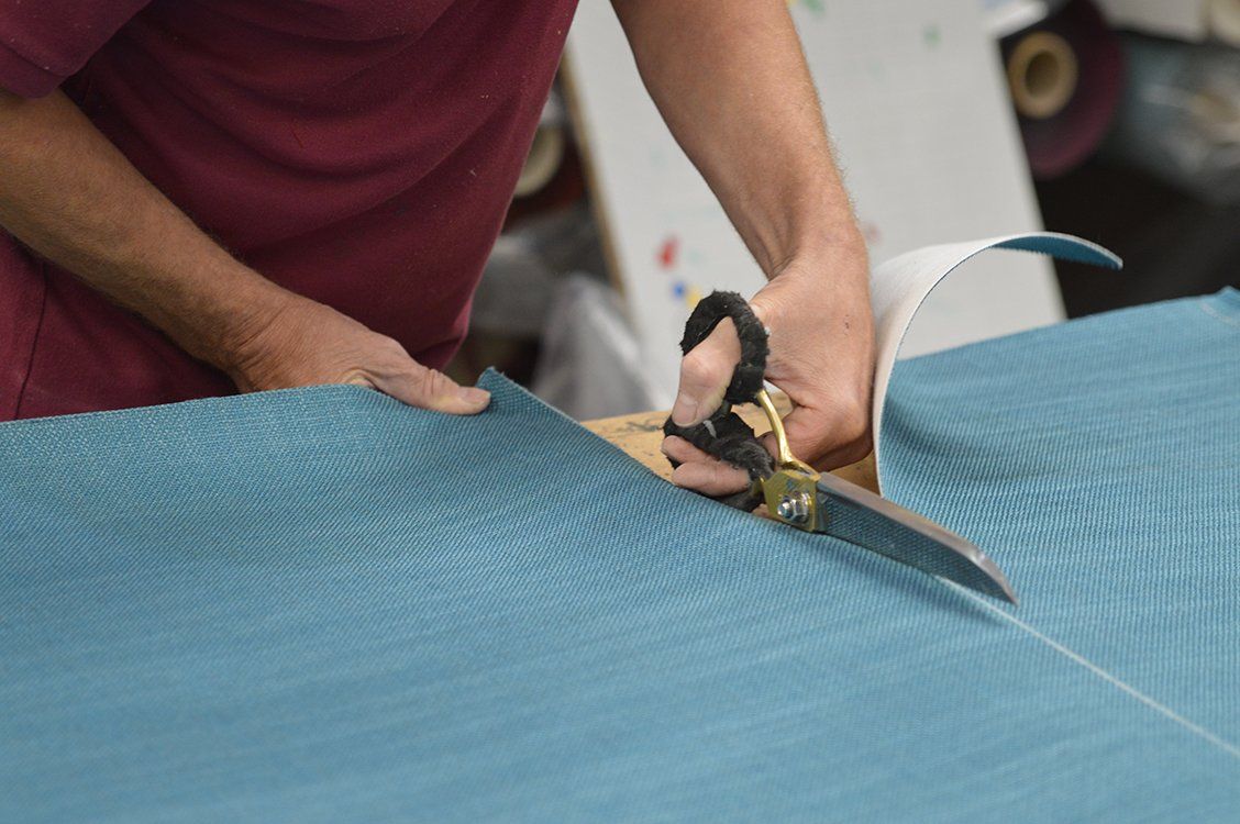 Fabric cutting worker