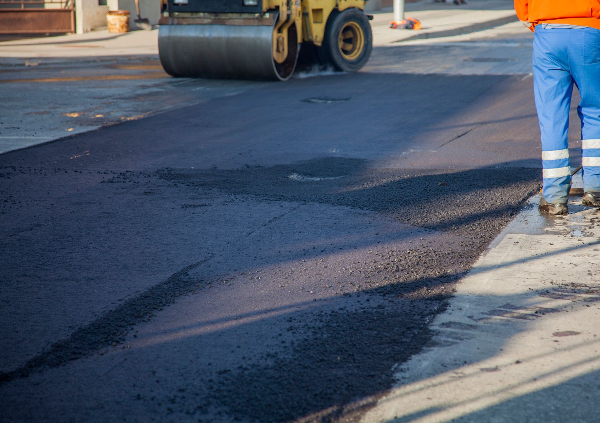 Worker Sealing Road — Birmingham, AL — Southeastern Sealcoating, Inc.