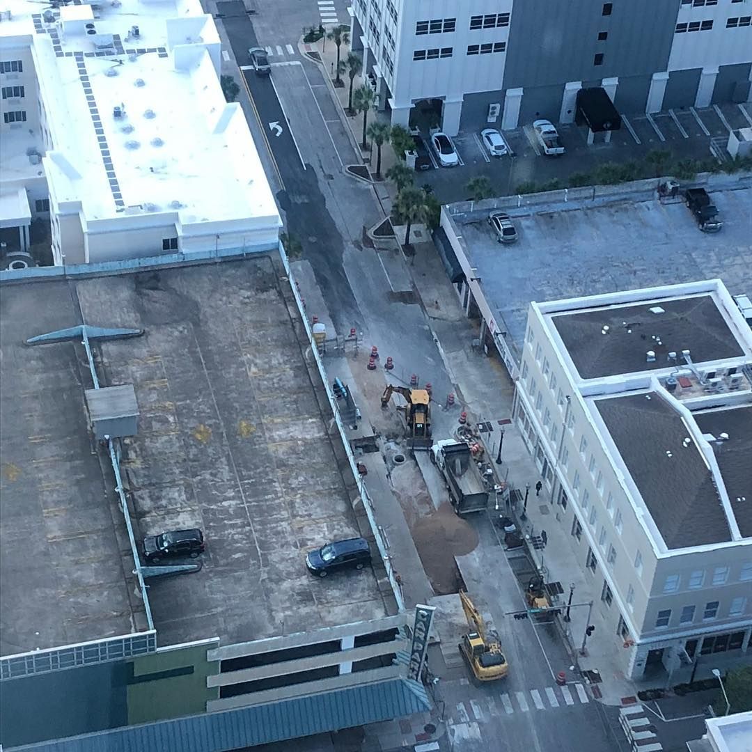 Worker Repairing Road — Birmingham, AL — Southeastern Sealcoating, Inc.