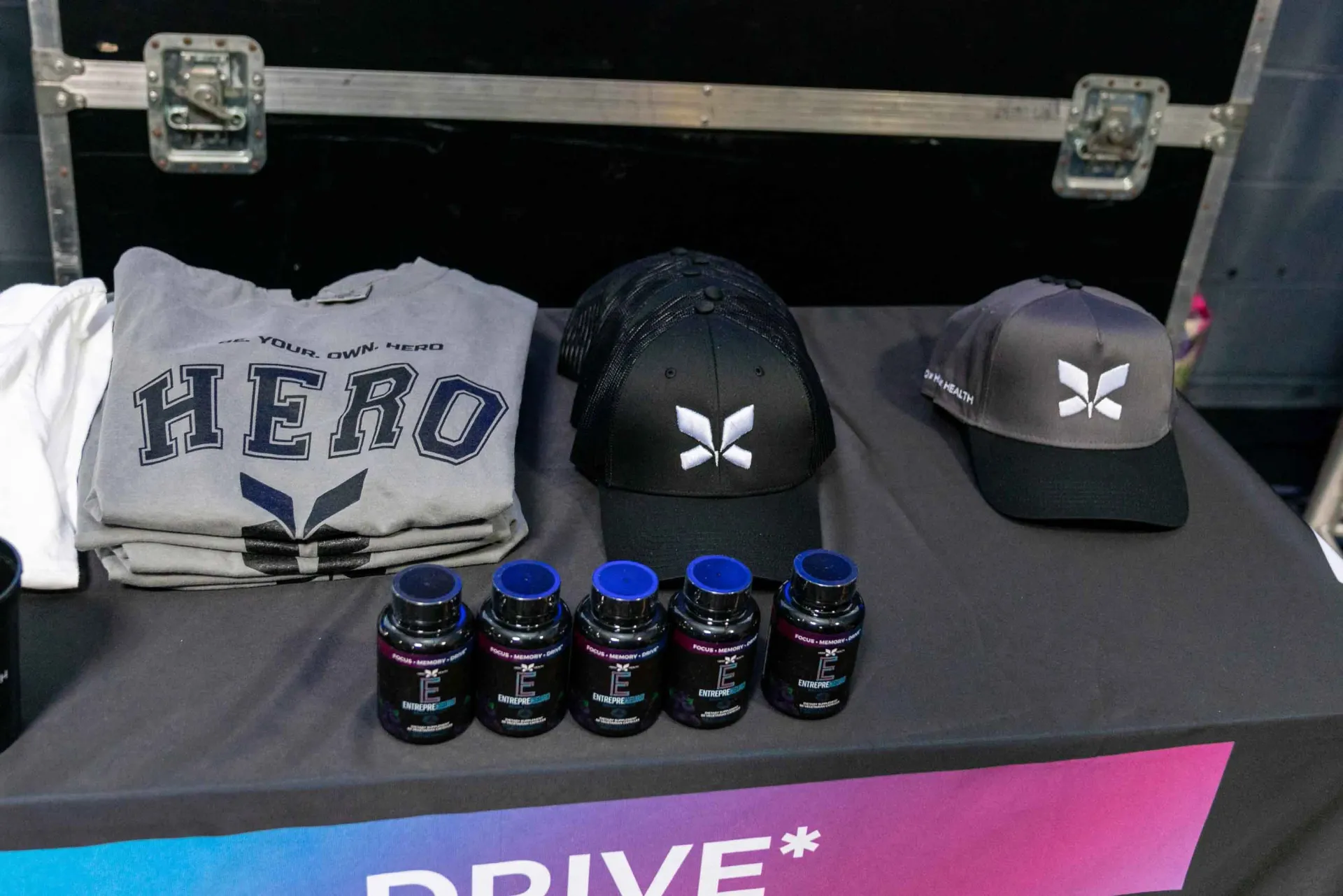 A table with a shirt that says hero on it