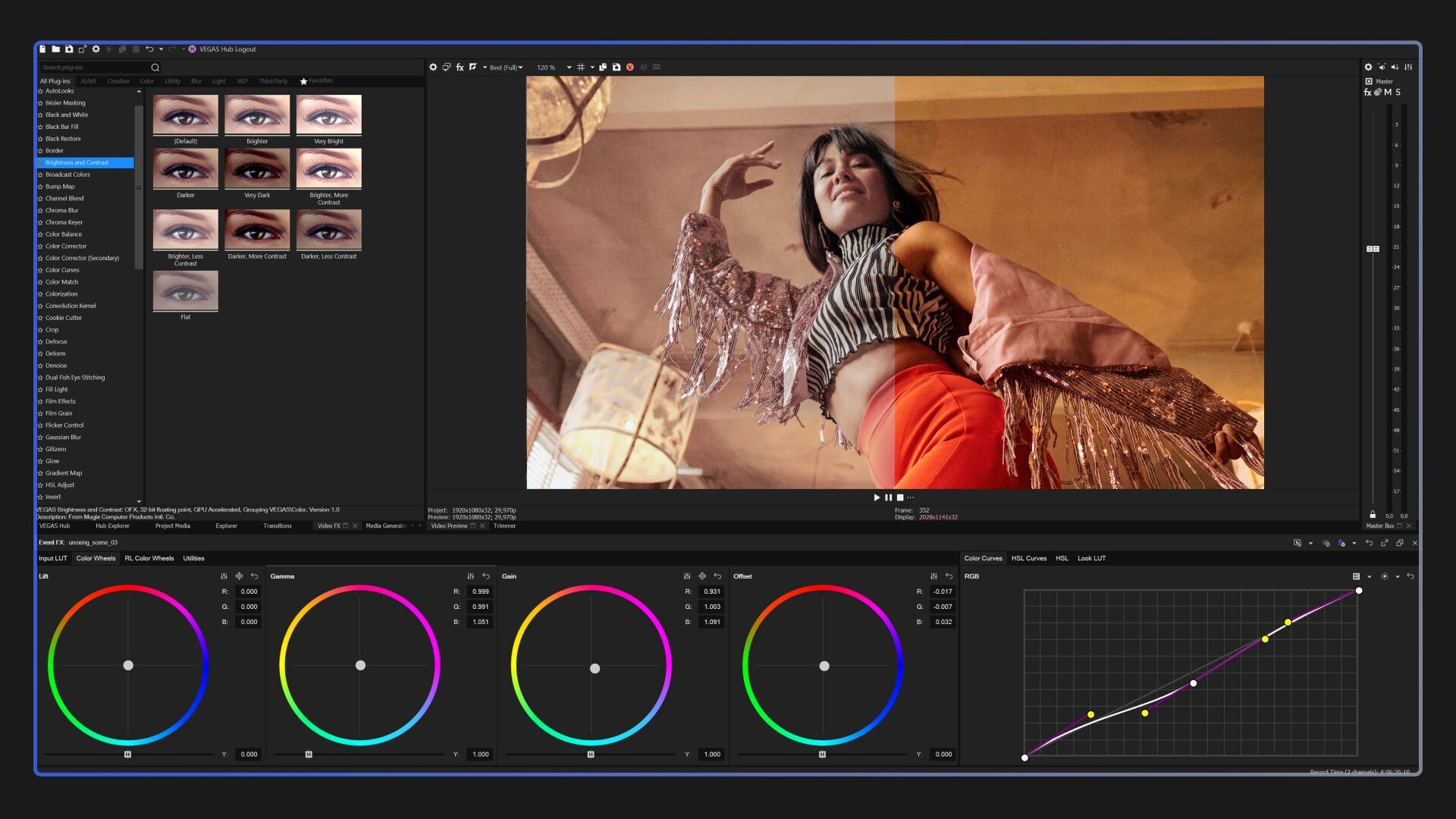 A woman is dancing in front of a computer screen.