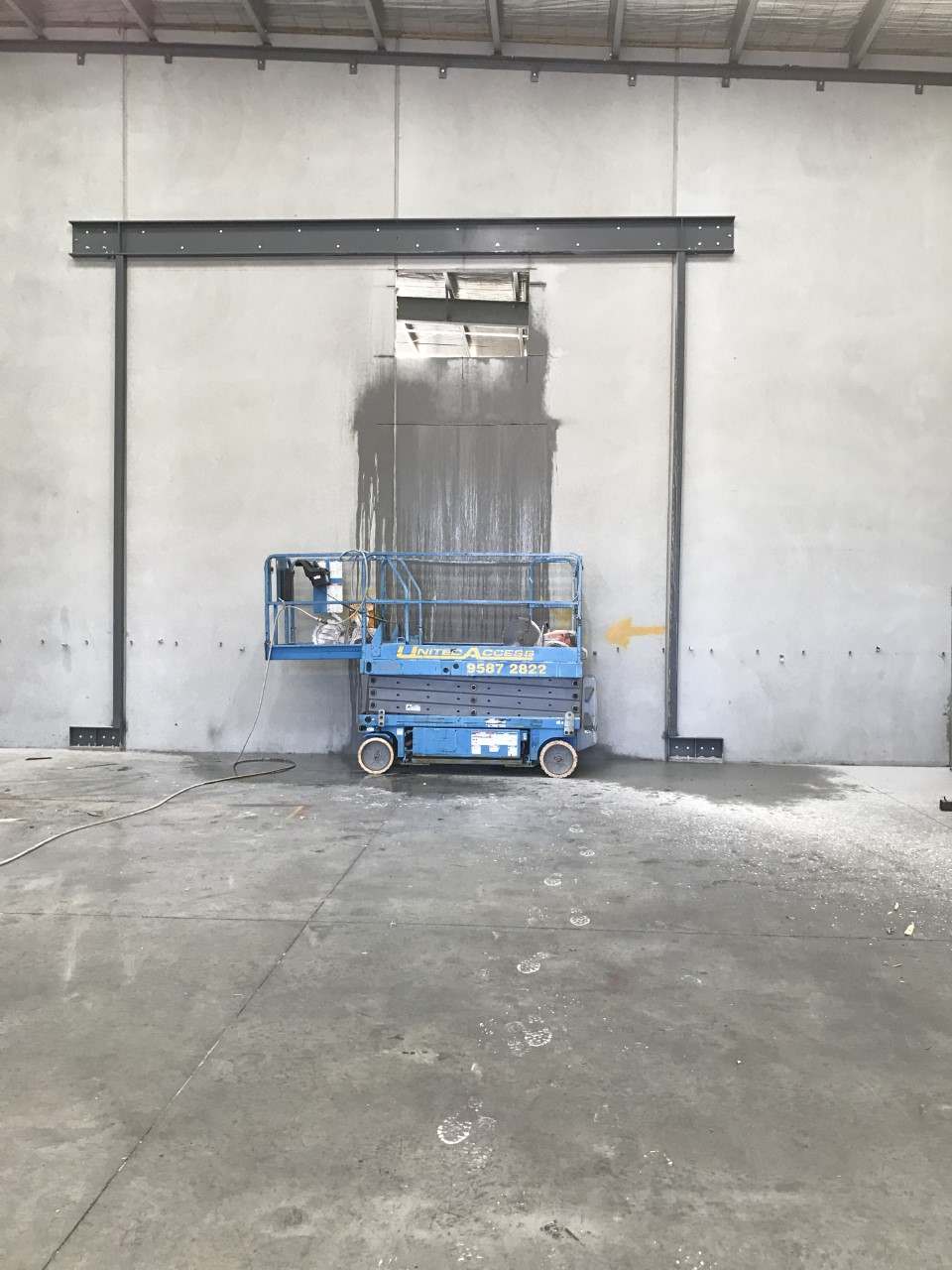 concrete wall being repaired