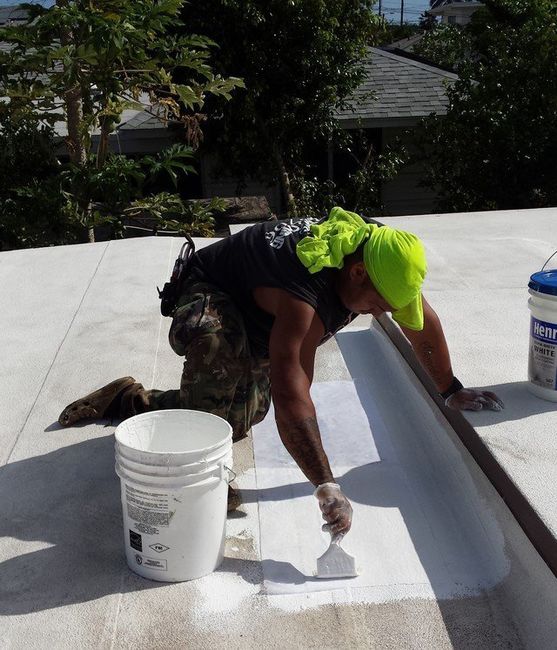 Professional roofer at work site