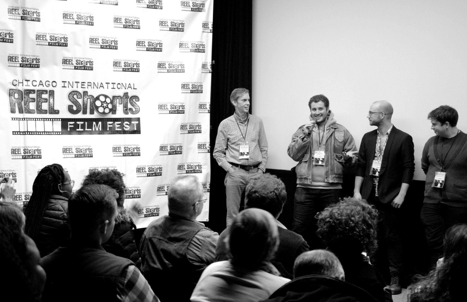 Panel at the Chicago Reel Shorts Film Fest, with speakers and audience.