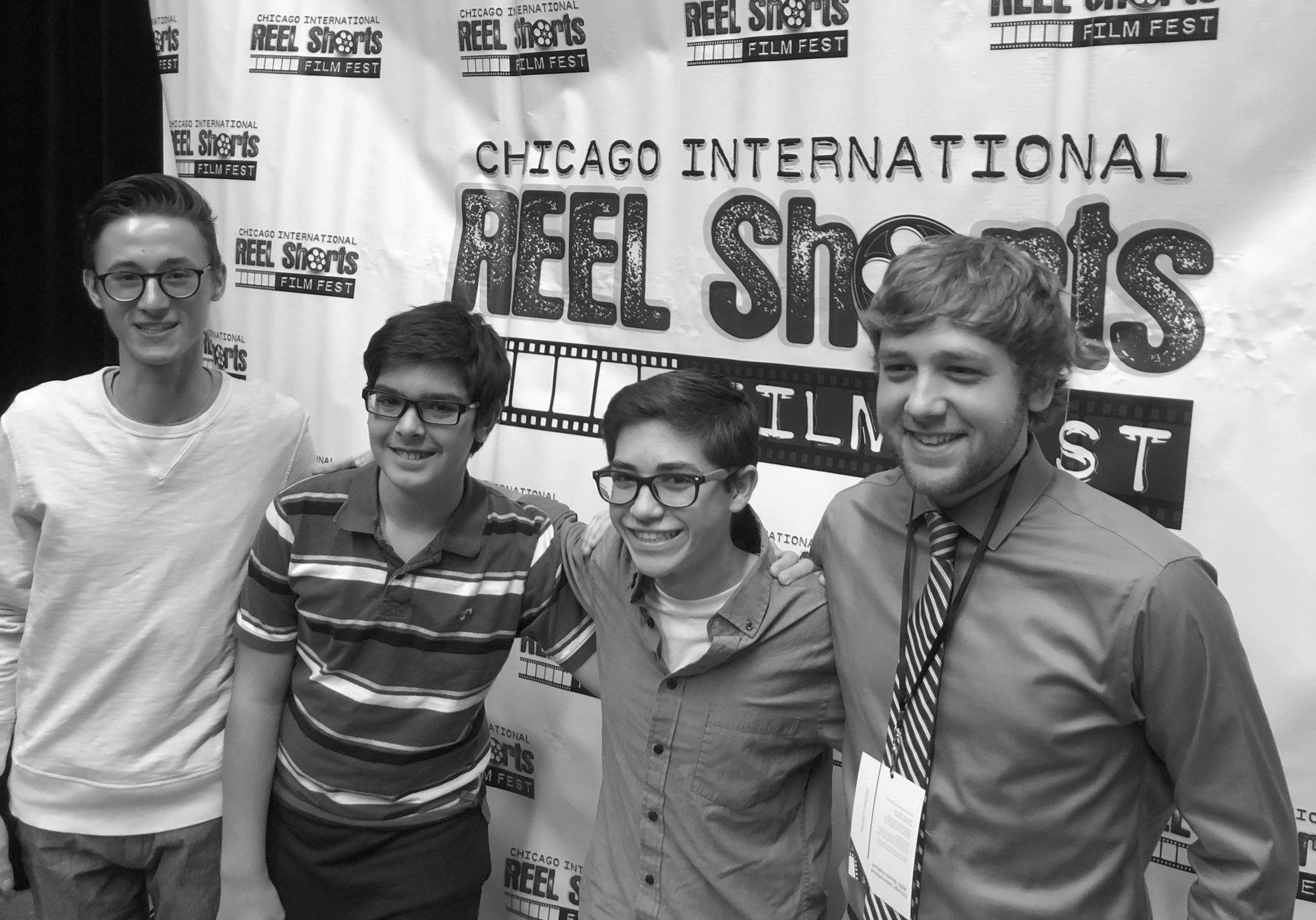 Four young men pose at the Chicago International Reel Shorts Film Fest.