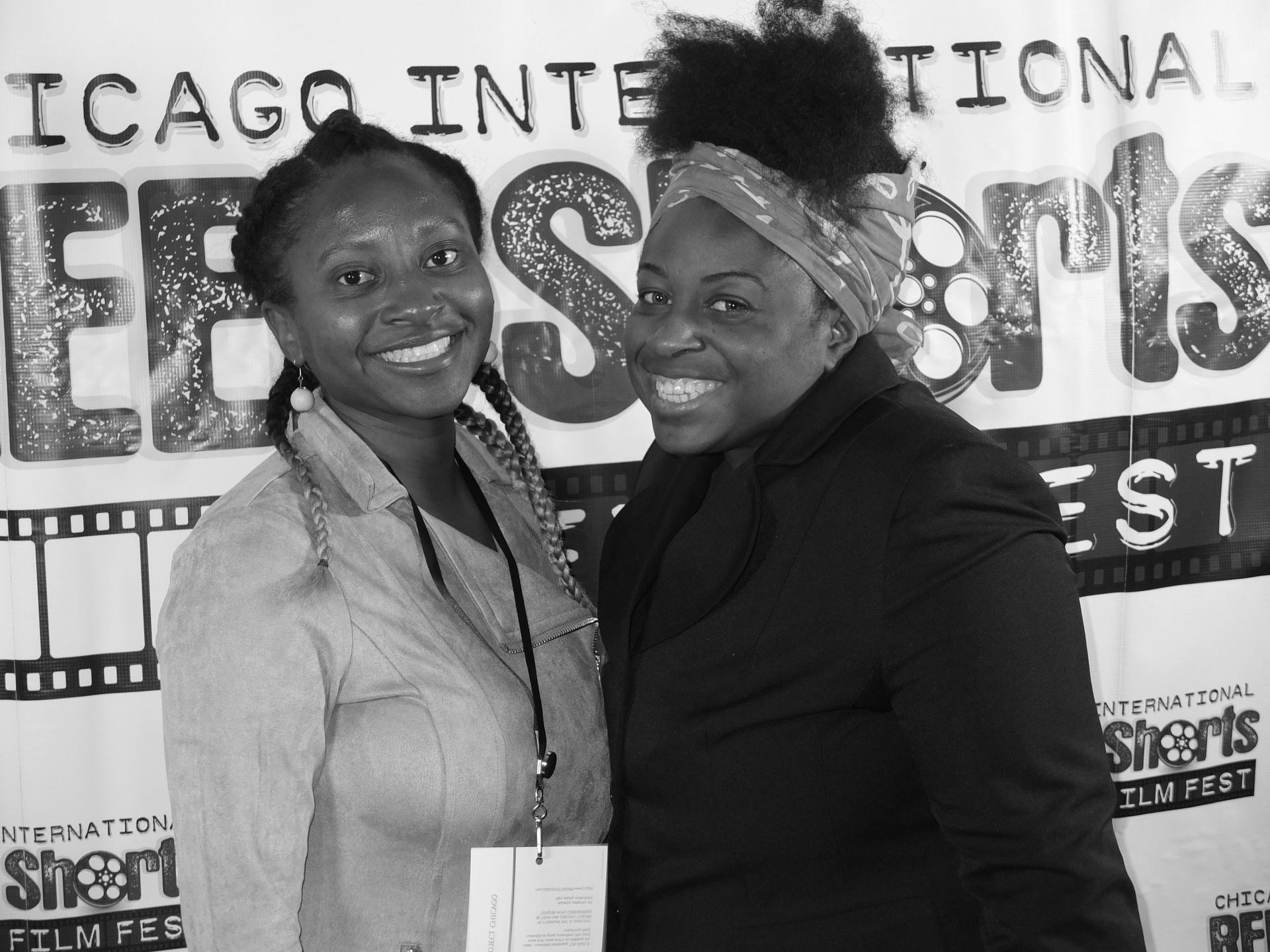 Two smiling Black women pose at the Chicago International REEL Shorts Film Fest.