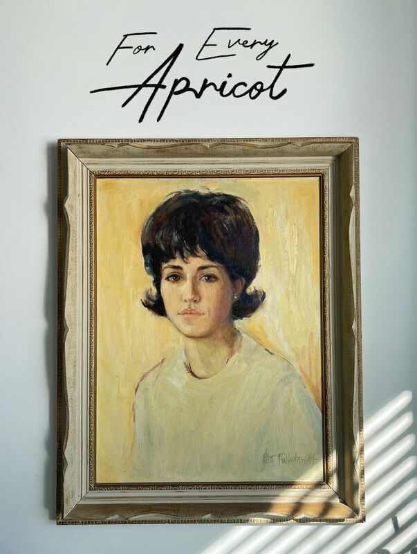Oil portrait of a woman in a vintage frame; light background, 