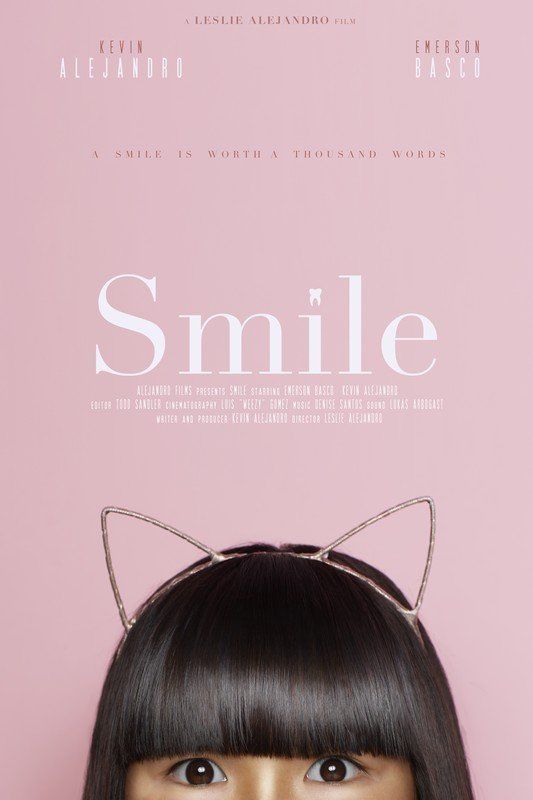 A poster for a movie called smile with a woman wearing cat ears