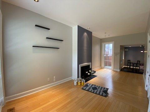 painter using a roller brush