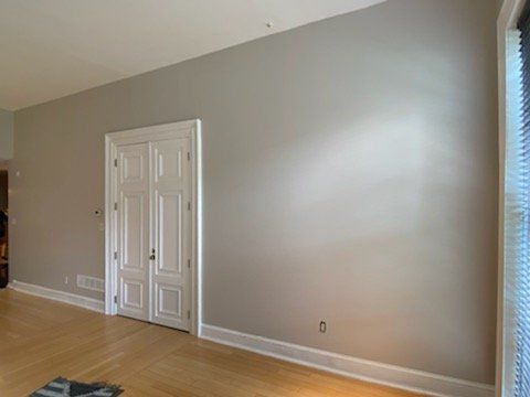 man painting the ceiling