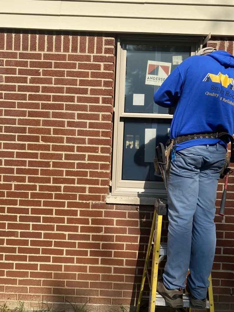 a man on a ladder on a ladder.