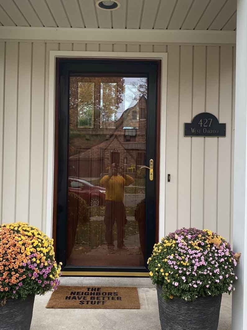 a person standing in front of a door.