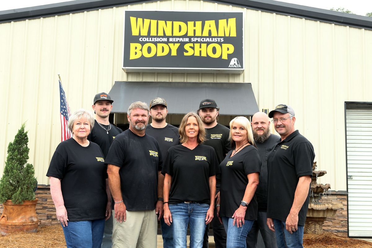 Our expert staff in front of our shop | Windham Bodyshop