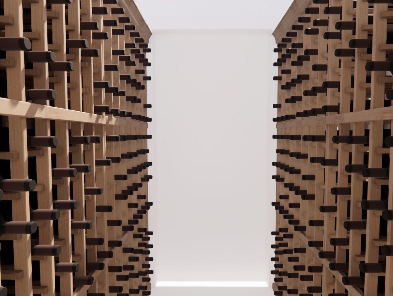 A row of wooden buildings with a white wall in the background