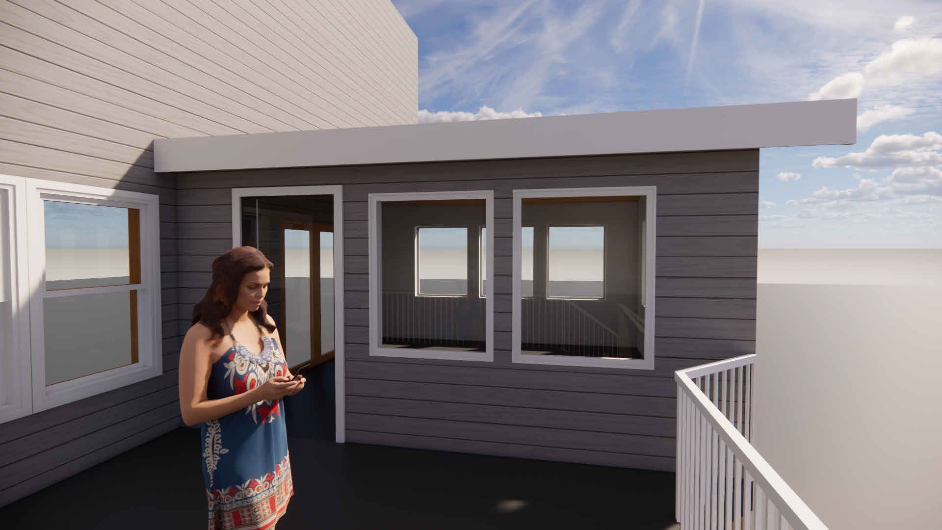 A woman in a blue dress is standing on a balcony looking at her phone.