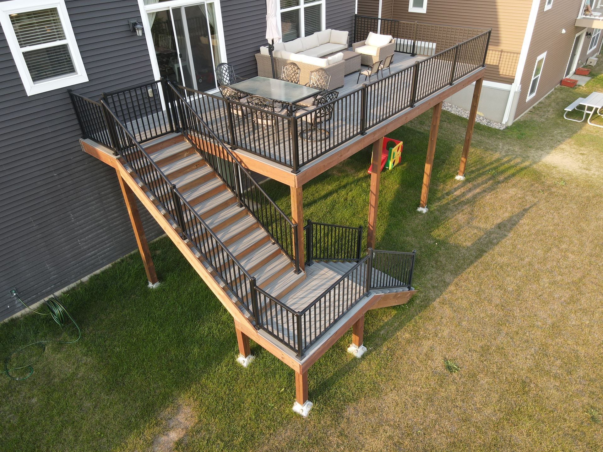 An aerial view of a deck with stairs leading up to it.