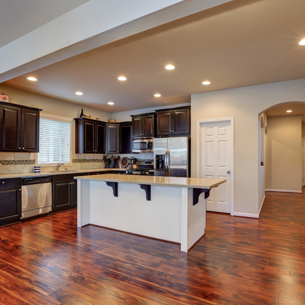 Remodeled open kitchen by Hampton Construction & Development