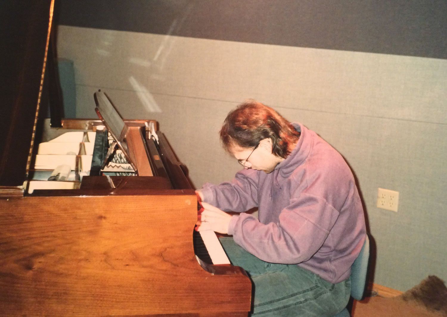 Michael Newhouse Allison playing piano during Where Eagles Fly recording session 1993.