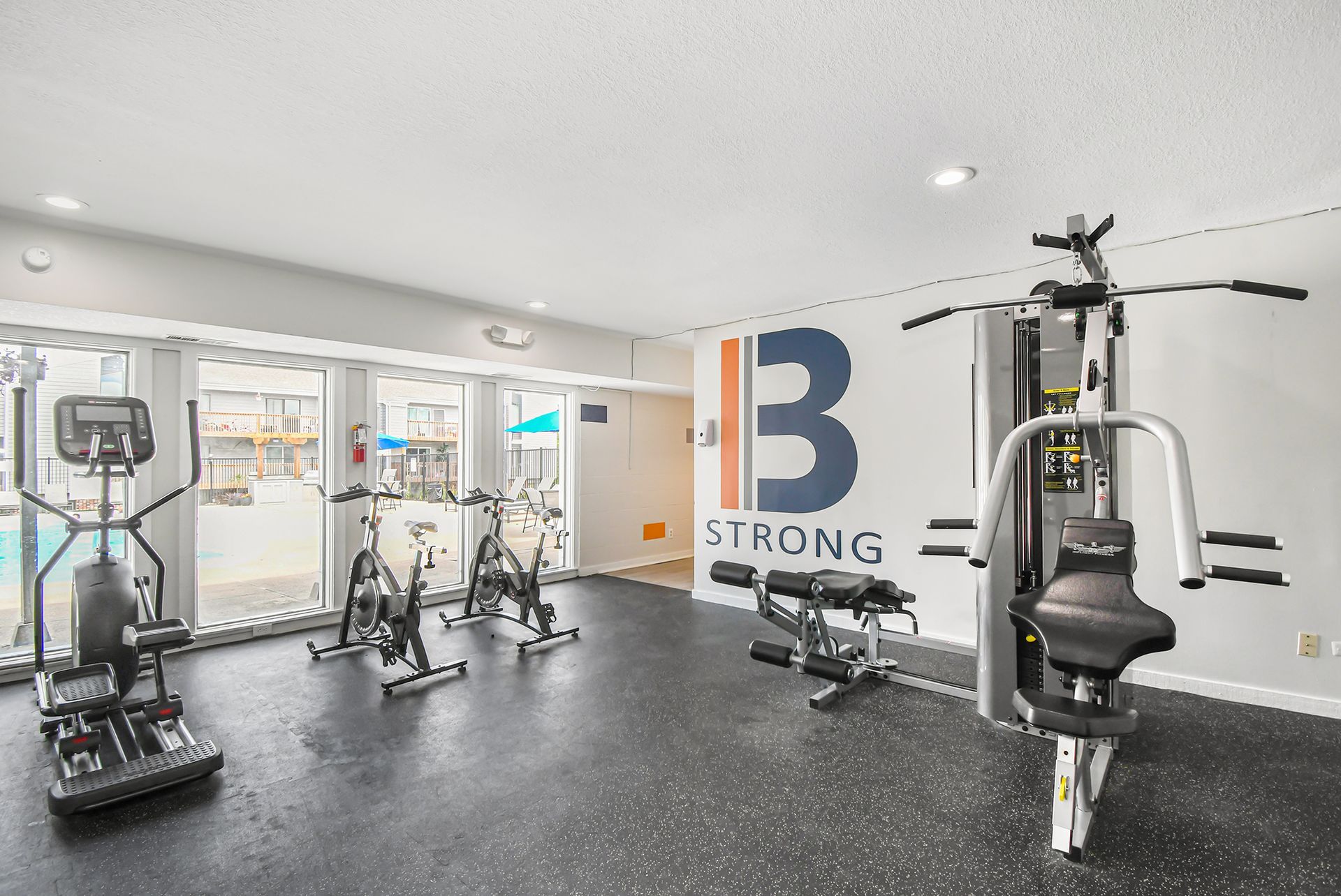 Gym with fitness equipment, large 