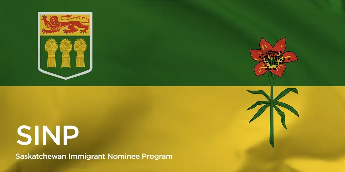 A green and yellow flag with a flower on it
