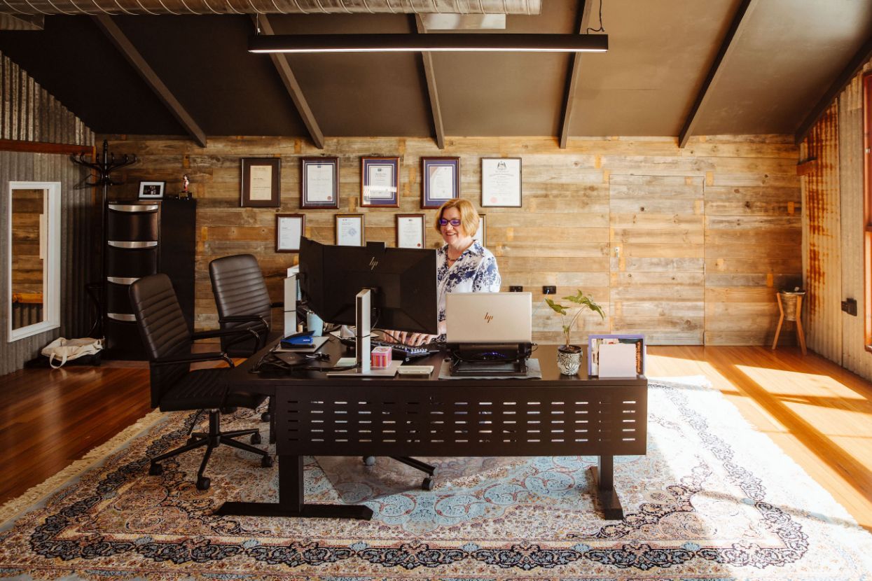 Happy Jane Working In The Office — Catalyst Accounting & Tax in Warwick, QLD