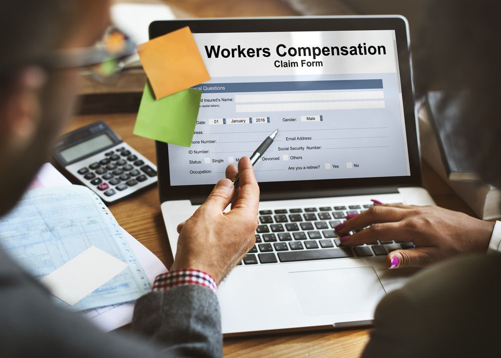 Laptop Computer to Fill Out a Workers Compensation Claim Form — Chris Trevor & Associates in Rockhampton, QLD