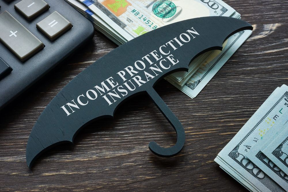Black Umbrella With Sign Income Protection Insurance — Chris Trevor & Associates in Gladstone Central, QLD
