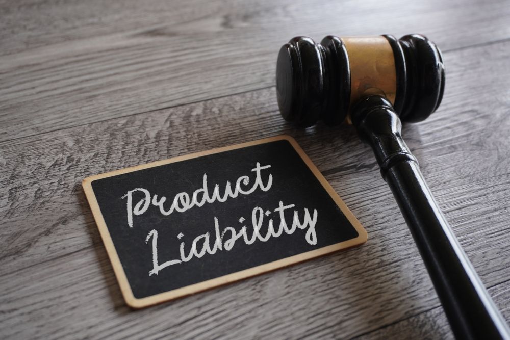 Judge Gavel On A Table And Product Liability Written On A Small Board — Chris Trevor & Associates in Gladstone Central, QLD