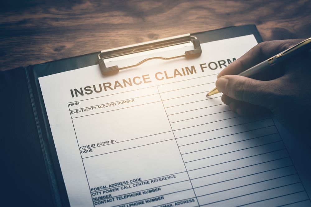 Insurance Claim Form on Clipboard — Chris Trevor & Associates in Gladstone Central, QLD