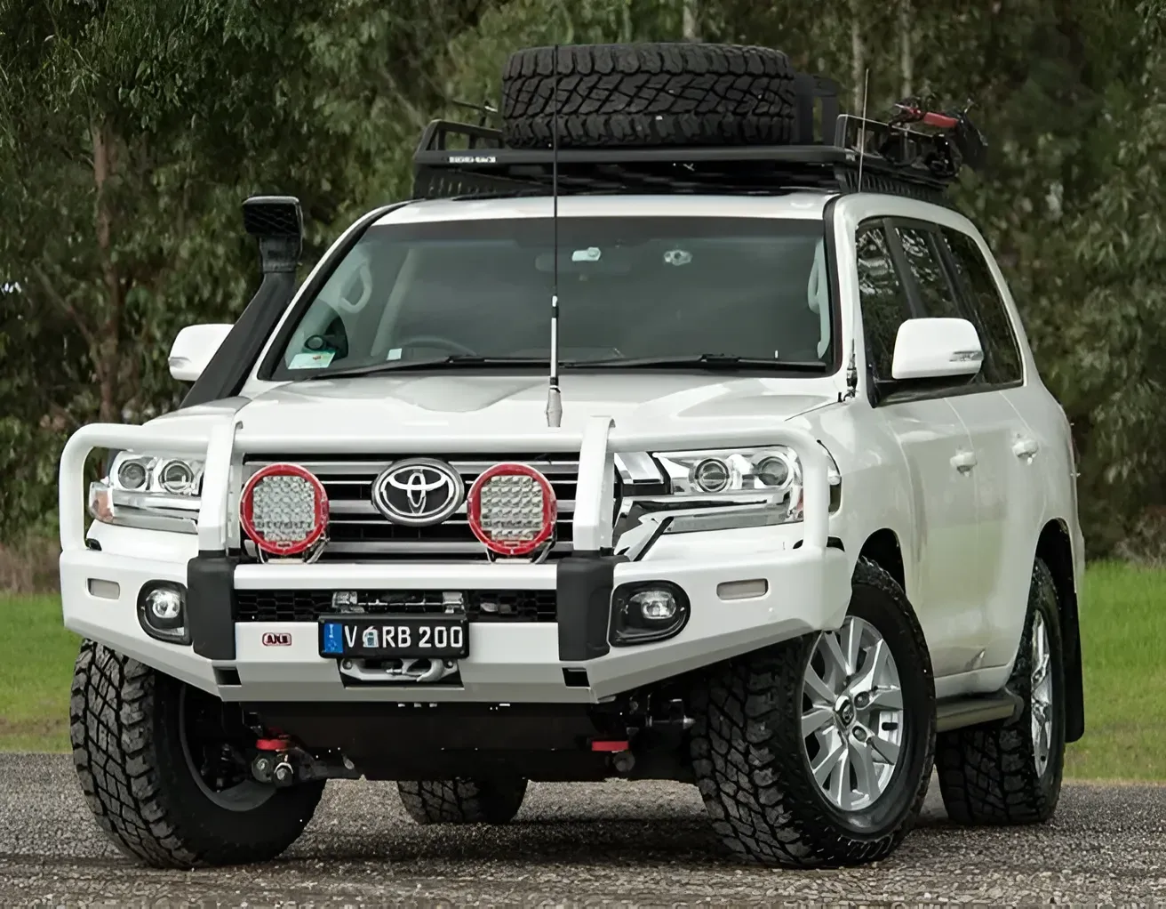 A White Toyota Land Cruiser is Parked on the Side of the Road — Emerald 4x4 in Emerald, QLD