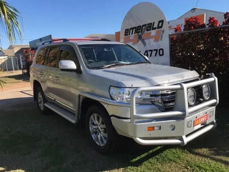 A Silver Suv is Parked in Front of a Sign That Says Emerald 4x4 — Emerald 4x4 in Emerald, QLD