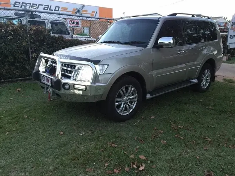 A Silver Suv is Parked in Front of a Building That Says Emerald — Emerald 4x4 in Emerald, QLD